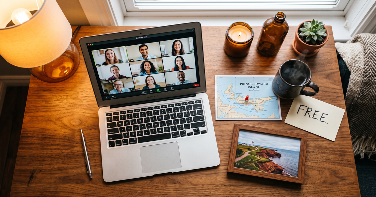 Laptop showing a Zoom recovery meeting next to a map of Prince Edward Island with a pin and a framed photo of red cliffs coastline, free AA and NA meetings across Prince Edward Island