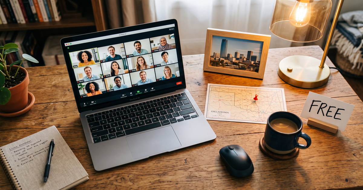 Laptop showing a Zoom recovery meeting next to a map of Oklahoma with a pin and a framed photo of Oklahoma City skyline, free AA and NA meetings across Oklahoma