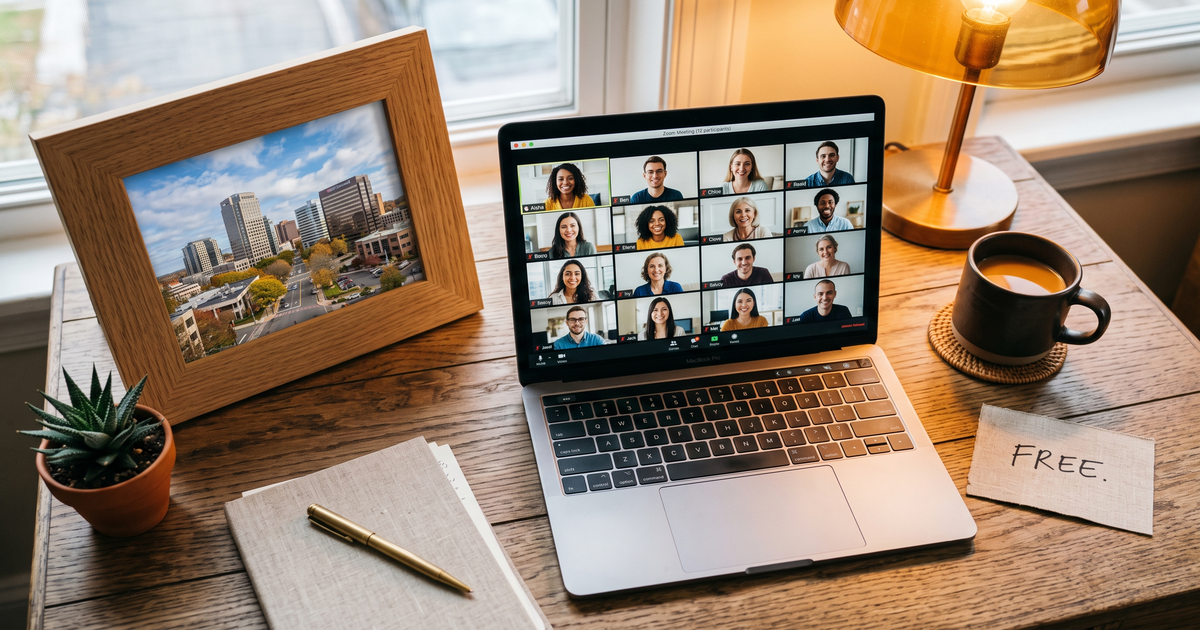 Laptop showing a Zoom recovery meeting with a framed photo of Stamford Connecticut downtown, free AA and NA meetings in Stamford