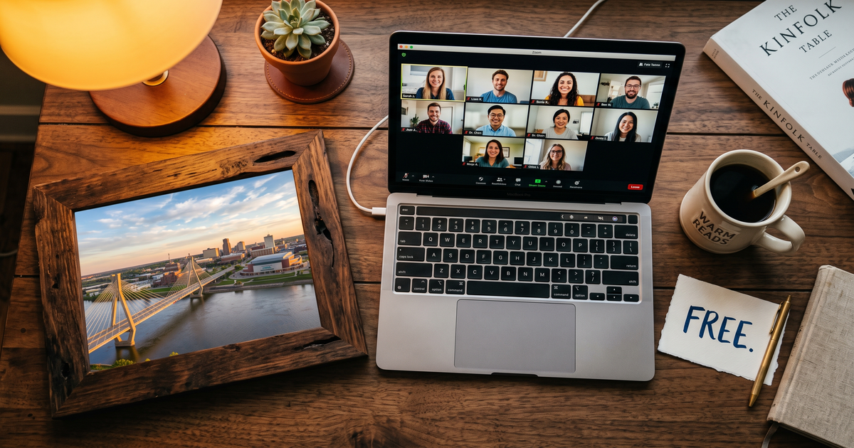 Laptop showing a Zoom recovery meeting with a framed photo of Sioux City Iowa riverfront, free AA and NA meetings in Sioux City