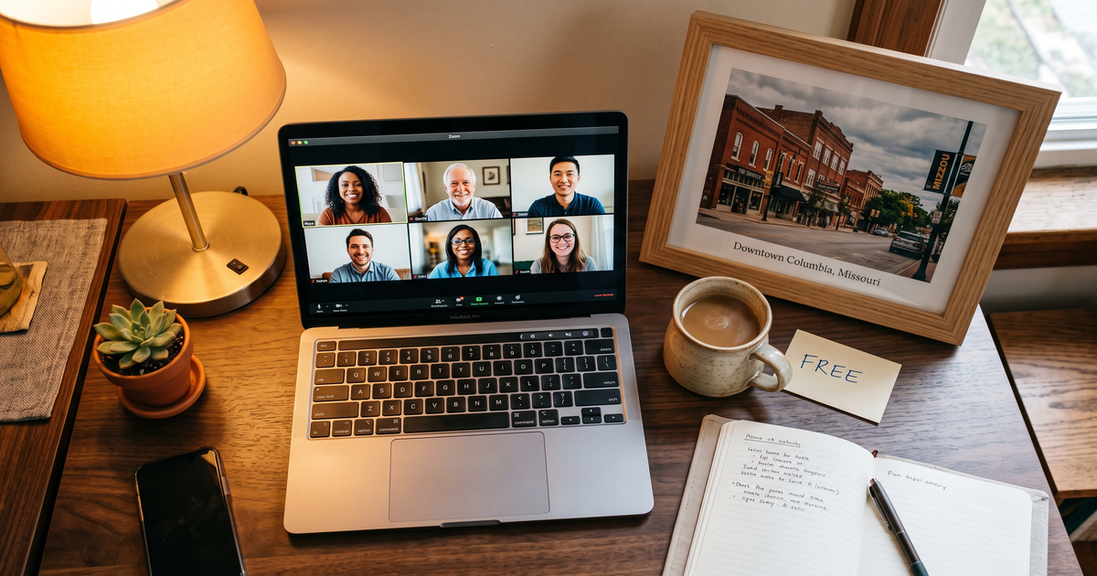 Laptop showing a Zoom recovery meeting with a framed photo of Columbia Missouri downtown, free AA and NA meetings in Columbia